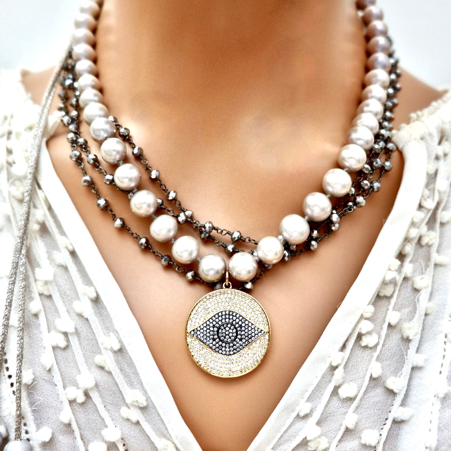 my grey pearl evil eye necklace