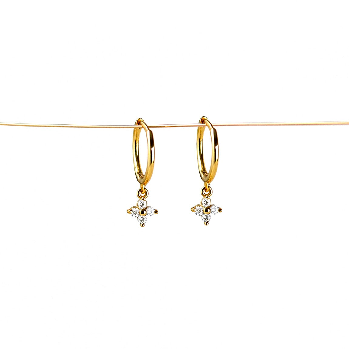 my tiny tiny clover earrings