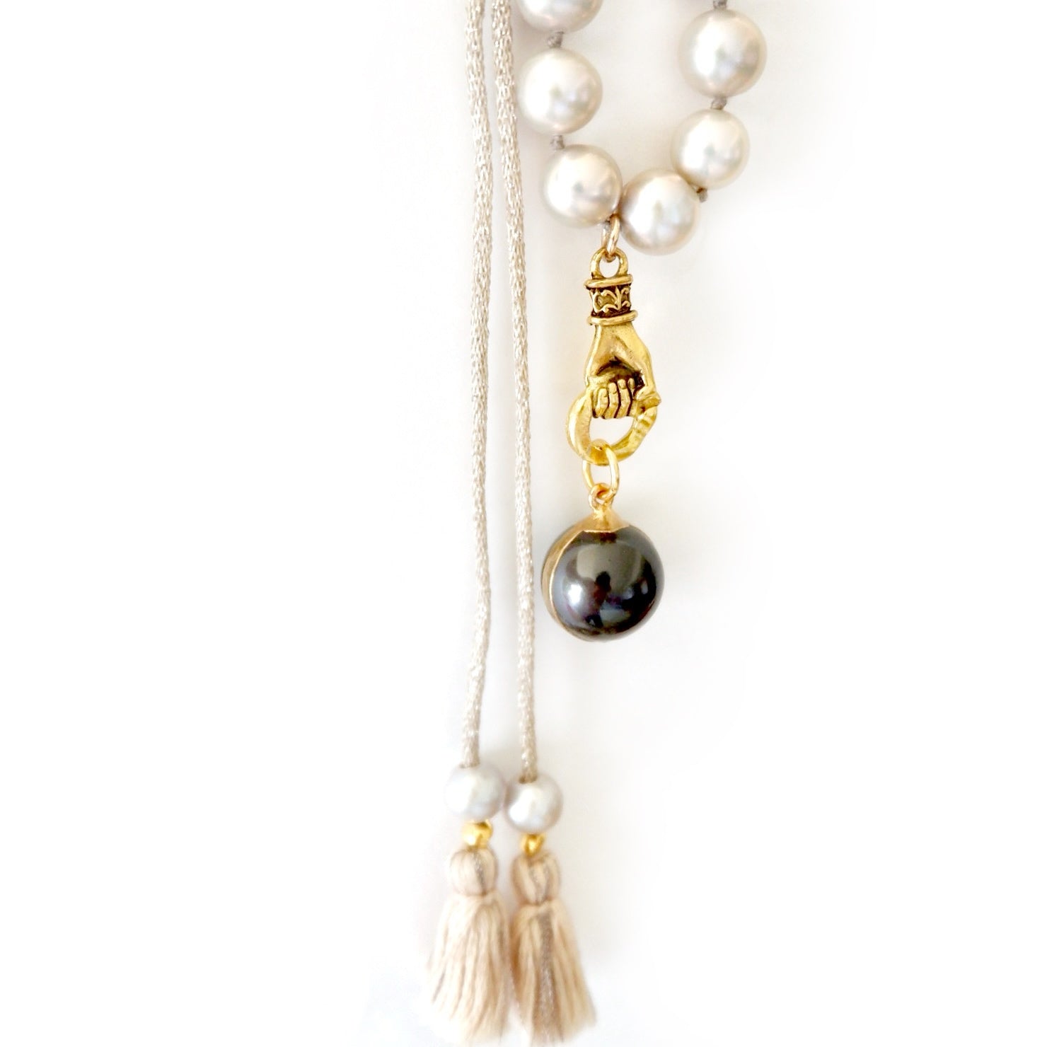 grey pearl in hand necklace
