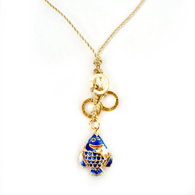 blue fish on a gold cord necklace