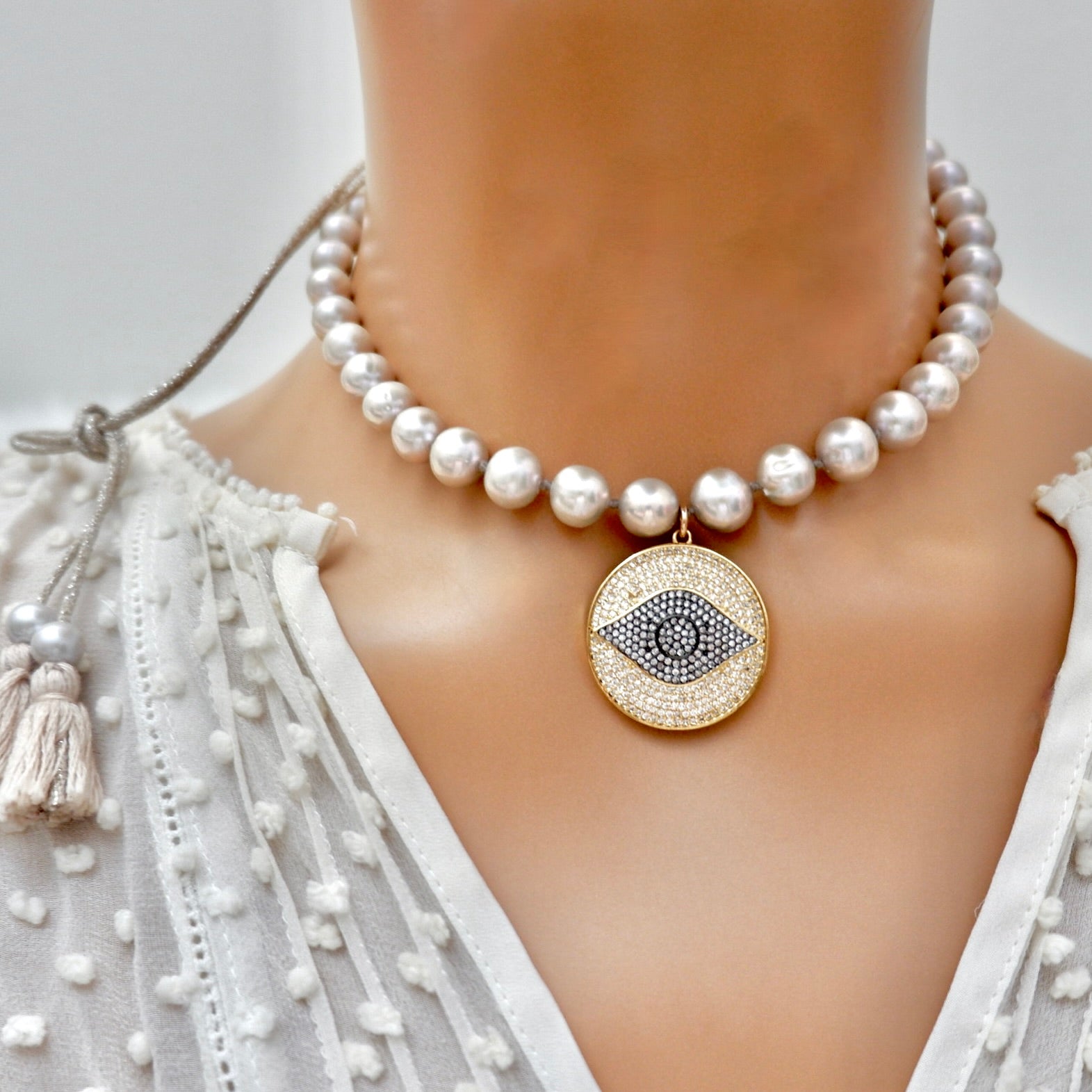 my grey pearl evil eye necklace