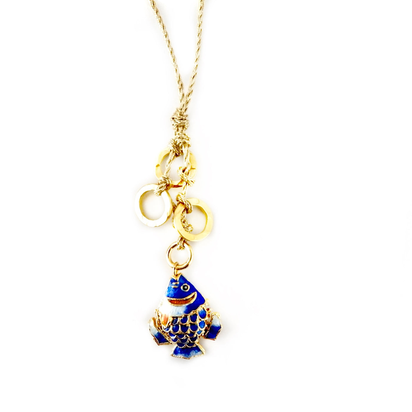 blue fish on a gold cord necklace