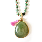green gemstone and heart love necklace