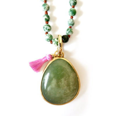 green gemstone and heart love necklace