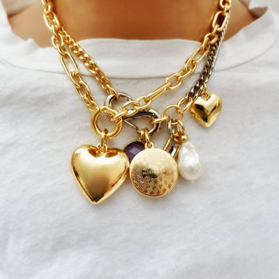 my puffy gold heart necklace