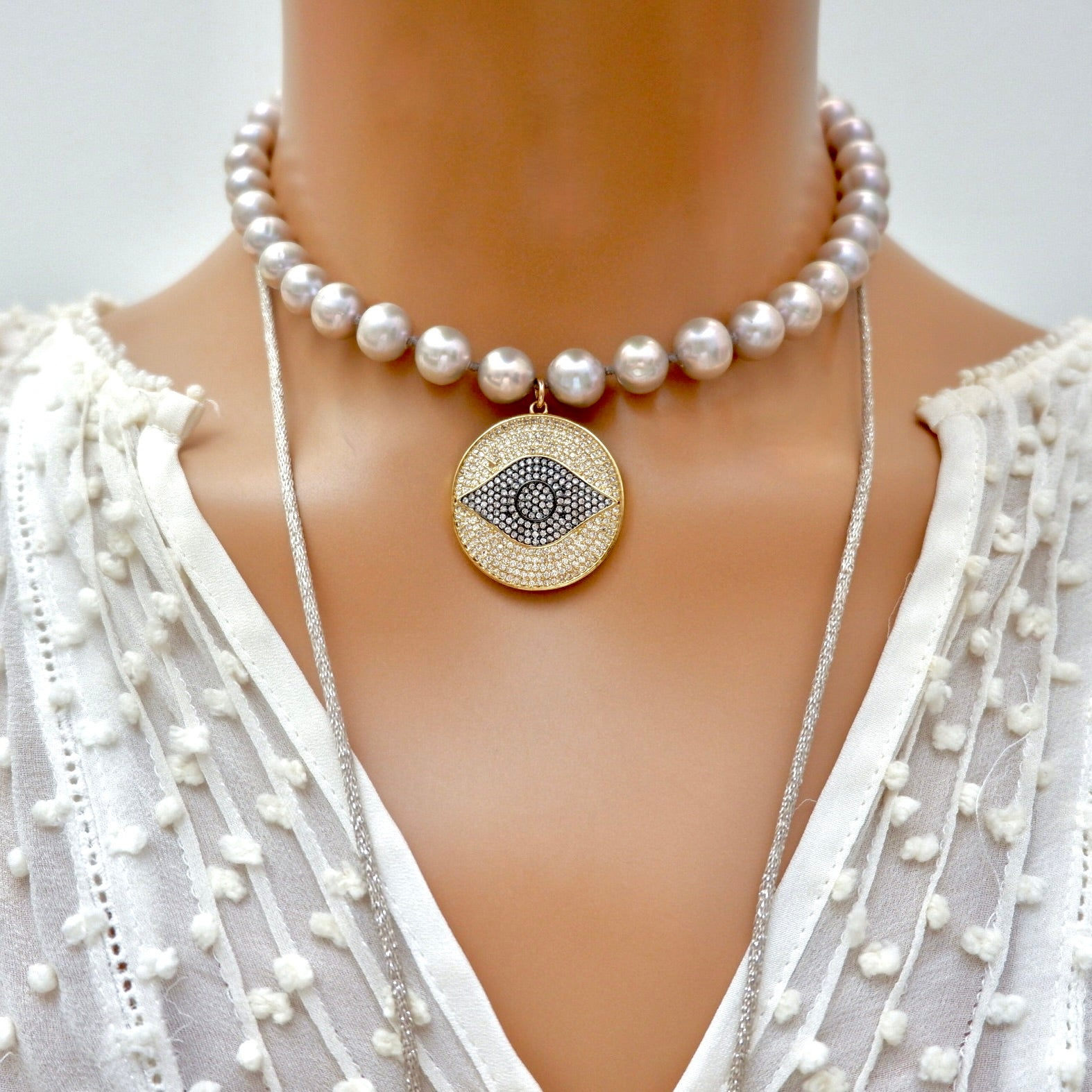 my grey pearl evil eye necklace