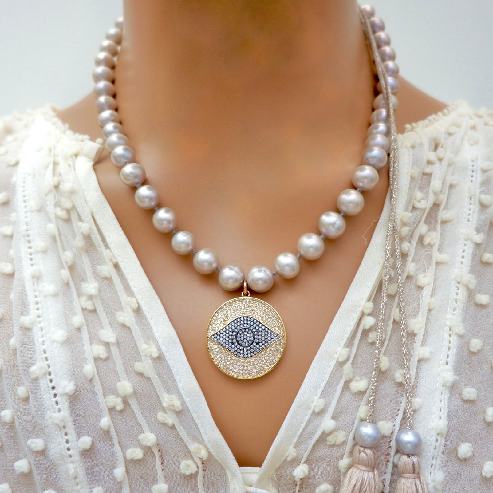 my grey pearl evil eye necklace