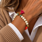 white pebbles and coral bracelet