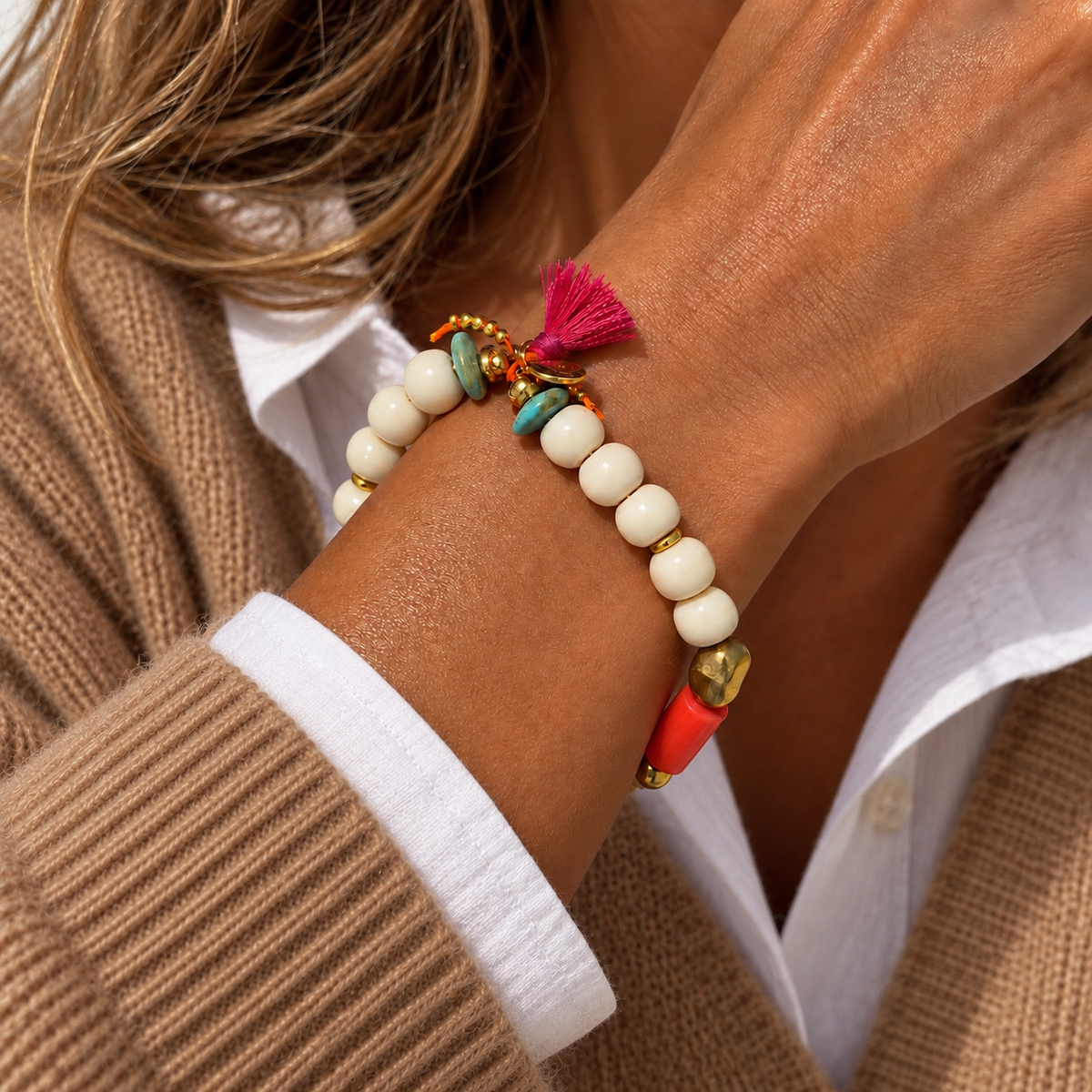 white pebbles and coral bracelet