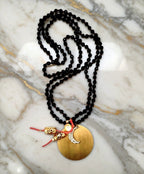 circle x moon necklace