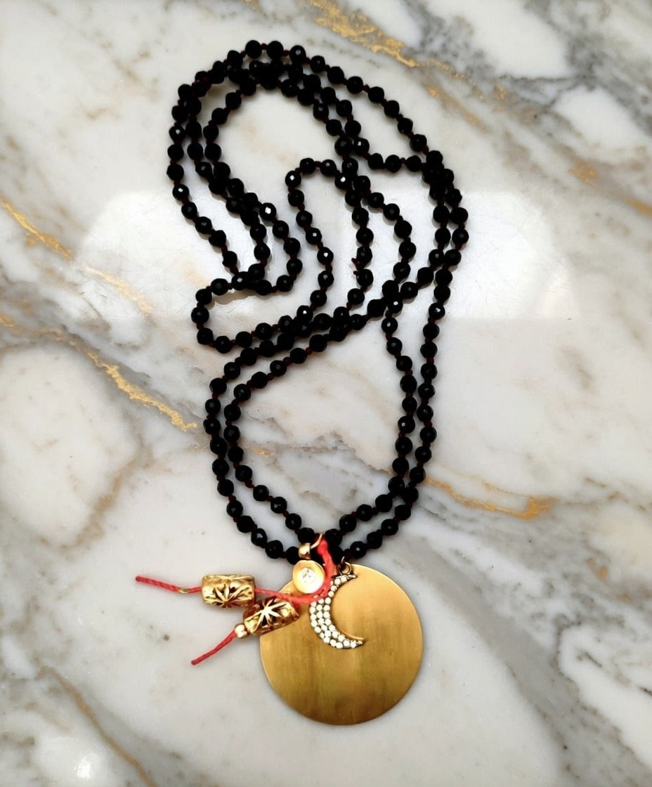 circle x moon necklace