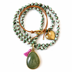 green gemstone x heart necklace