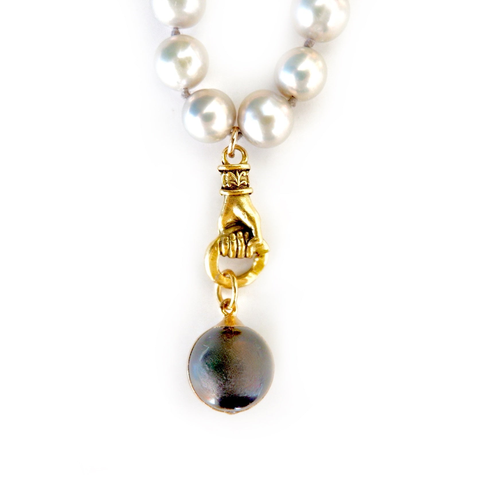 grey pearl in hand necklace