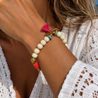 white pebbles and coral bracelet