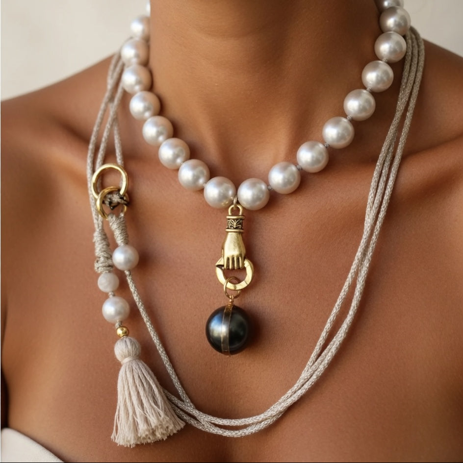 grey pearl in hand necklace