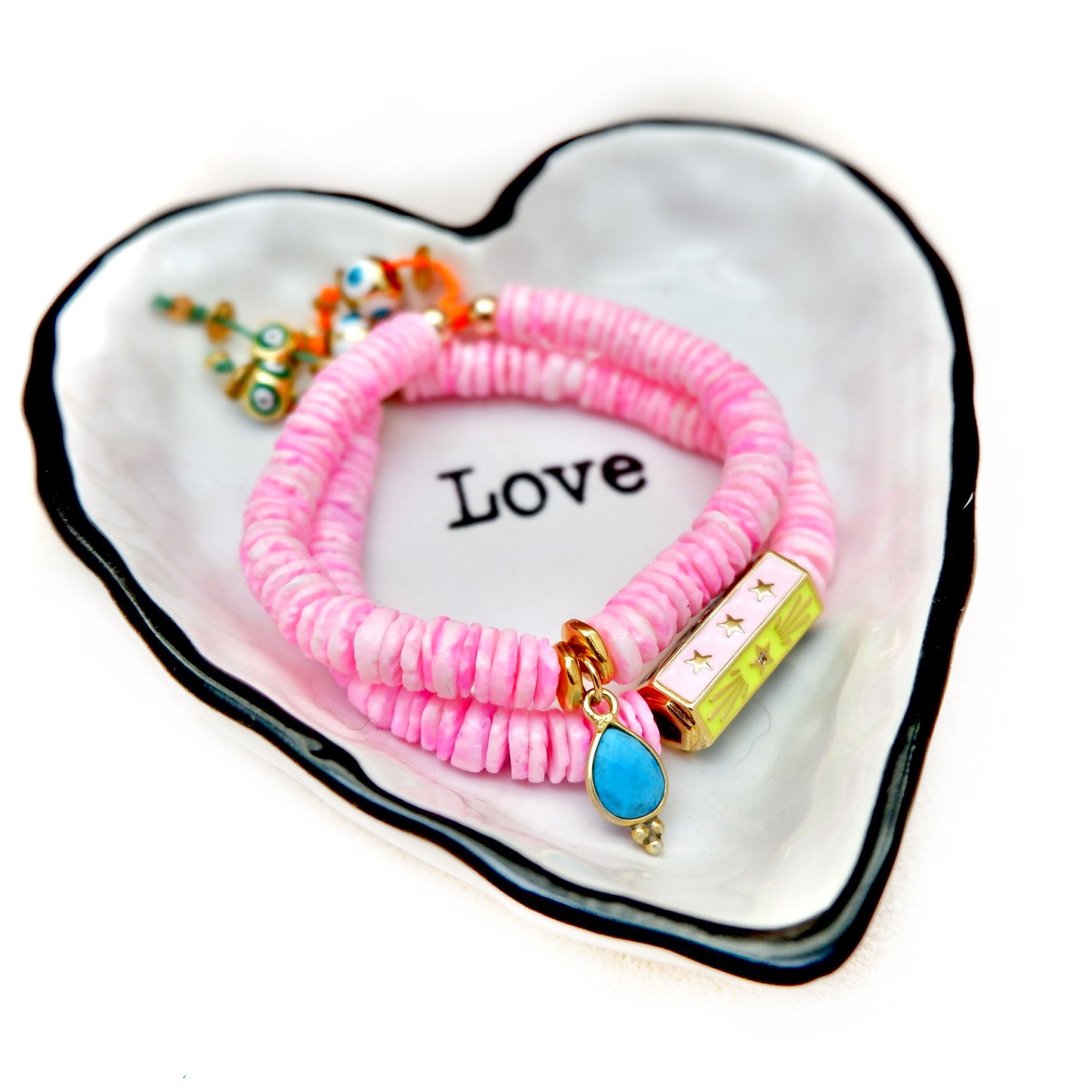 my set of twin pink shells bracelets