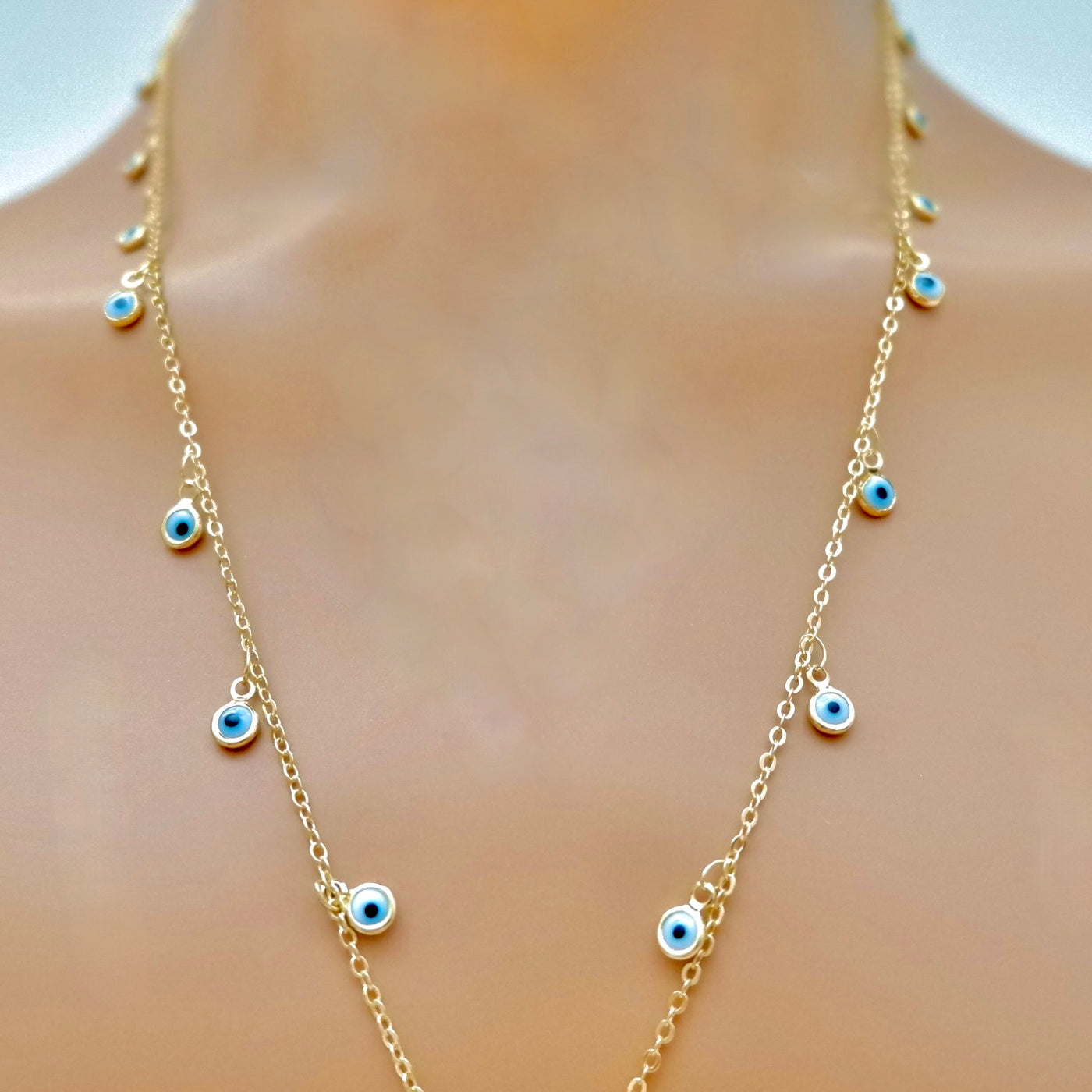tiny dangling eye charm necklace